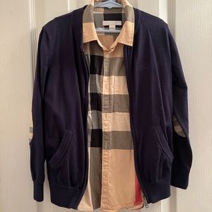 Blue elbow patch burberry sweater. Burberry Button down shirt not included.